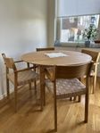 4 eleganta fåtöljer + runt matbord (förlängningsbart)