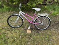Begagnad rosa tjejcykel Svalan City 5 - 24 tum