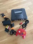 Nintendo 64 med kontroll och sladdar