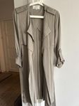 Ljusgrön trenchcoat