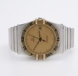 OMEGA "Constellation", kvartsverk med datumvisning
