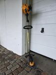 Motordriven gröstrimmer
