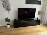 Ikea Bestå TV-bänk svart högblanka luckor 
