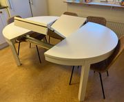 Utdragbart vitt runt bord