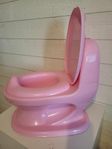 Potta ser ut som minitoalett i rosa för barn