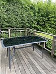 Utebord med glasskiva