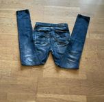 blåa nudie jeans