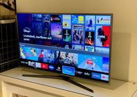 SAMSUNG 4K UHD - Smart TV