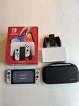 Nintendo Switch OLED + 128 GB MicroSD + Fodral
