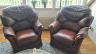 2 st skinnfåtöljer