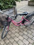 Flickcykel med korg