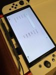 Nintendo switch oled 64gb + 128gb sd kort