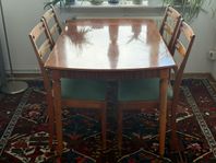 Fin retro matgrupp i teak/mahogny med detaljer i mässing