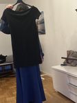 Svart glittrig Klänning i storlek 164
