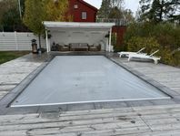 Begagnat hydrauliskt poolskydd halva nypriset
