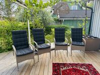 4 stycken konstrotting stolar i natur med svart dyna 