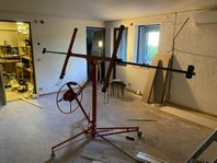 Skivhiss/gipslyft med tiltfunktion