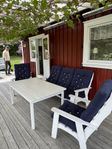 Trädgårdsmöbel med marinblå dynor