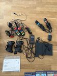 Playstation 2 med massa spel och tillbehör