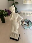 staty kvinna romersk eller grekisk? 