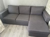 Grå bäddsoffa med förvaring från MIO 