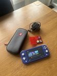 Nintendo Switch Lite + 3 spel + tillbehör