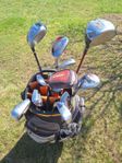 Golfbag med högfattade klubbor
