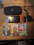 Nintendo Switch med 3 spel och väska