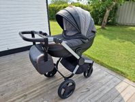 Barnvagn med en extra liggdel