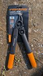 Fiskars grensax med utväxling och mothåll