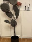 planta gjord i metall