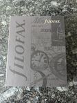 Filofax, röd läder med sidor i