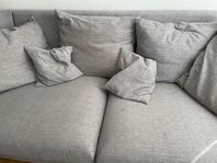 Soffa grått tyg