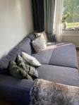 Grå bäddsoffa divan 