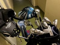 Golfklubbor och vagn