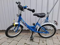 Fin barncykel Puky 16 tum med flagga och stödstång