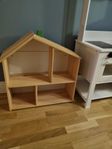 Flisat hus med leksak