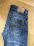 Nudie jeans blåa strl. 30/32