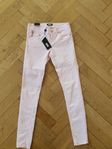 Rosa skinny ankle längd strl xs. 199kr nya.