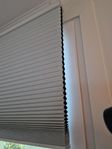 Mörkläggande plisségardin