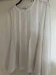 vit elegant blus levate‘