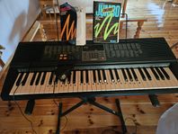 Keyboard Casio med golvstativ