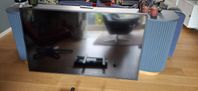 58" Samsung RU7105 Smart 4K UHD TV med väggstativ