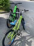Två gröna fina cyklar 24 och 20 tum