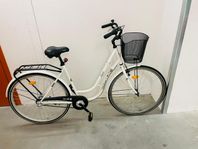 Vit cykel till salu