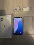 iPhone 11 i toppskick, 128 GB