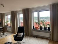 Eleganta gardiner och mörkläggningsgardiner