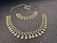Exklusivt smyckeset i 18K guld