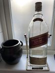 Whiskyflaska m ställning