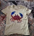 Beige t-shirt med paljettkrabba